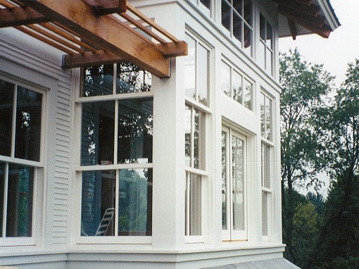 Triple Hung Windows with Motorized Awning Above
