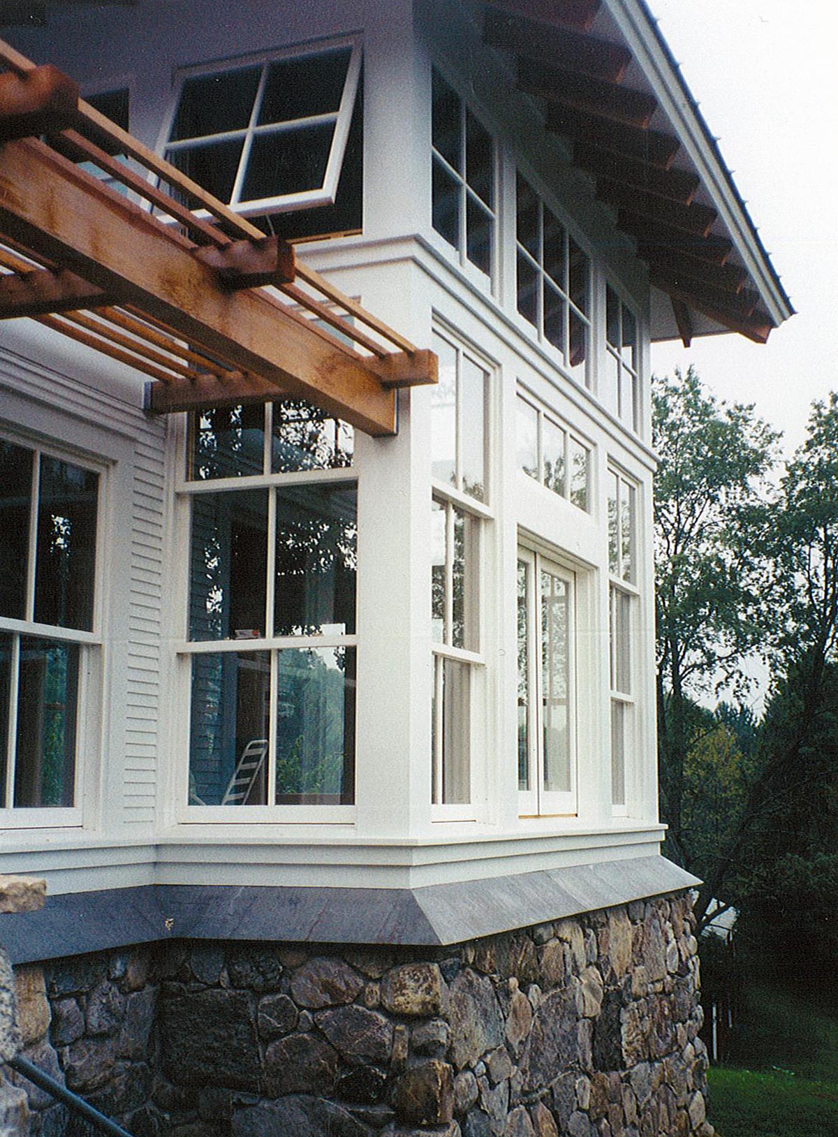 Triple Hung Windows with Motorized Awning Above